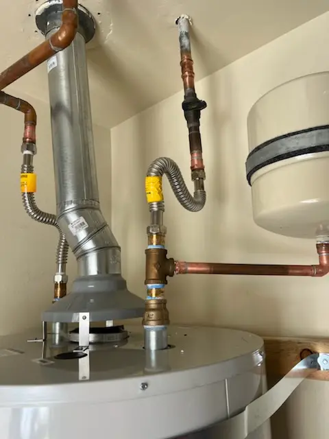 Water heater installation and plumbing repair in Rupple